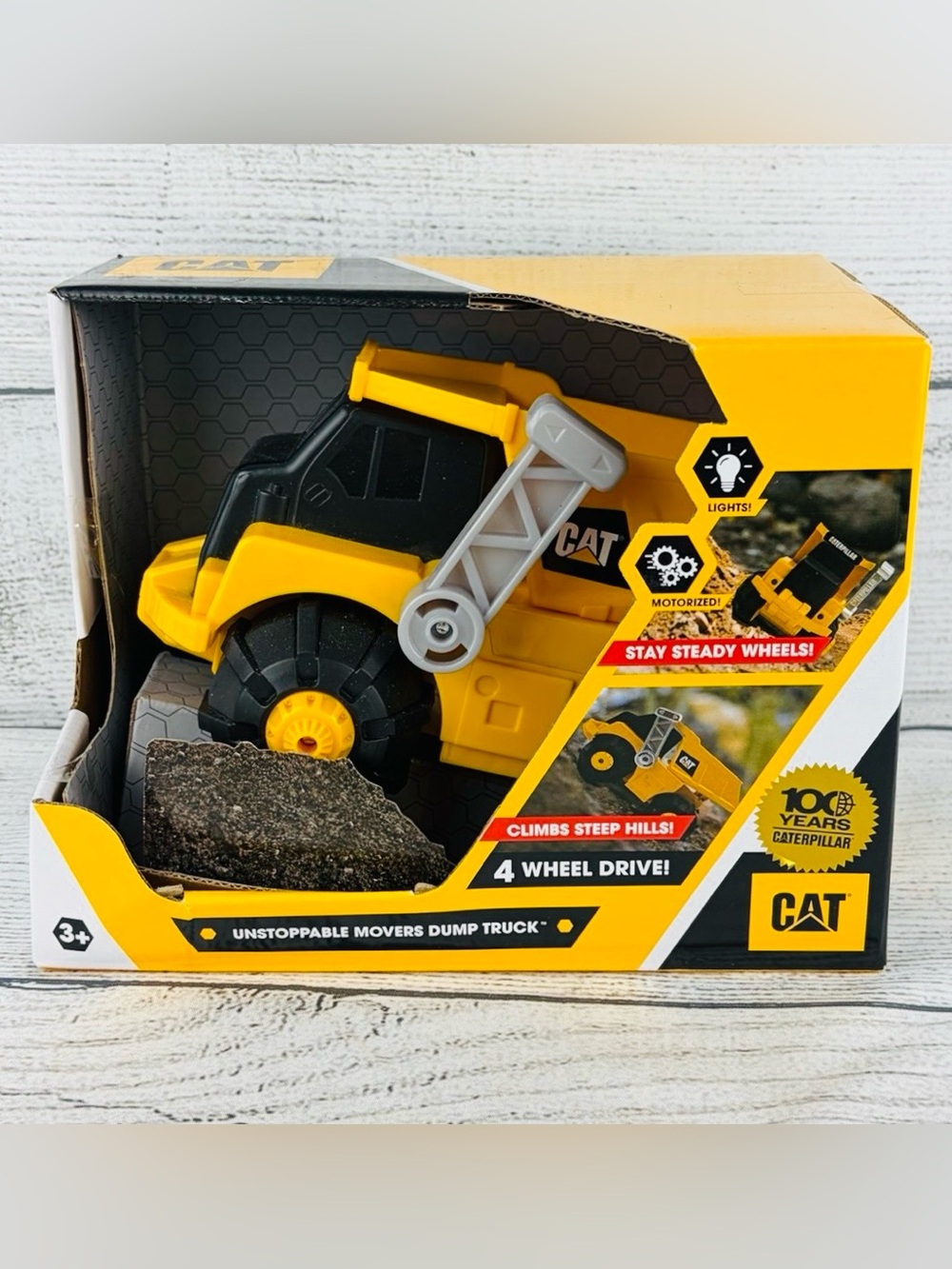 CAT Unstoppable Movers Dump Truck Toy w/ Lights & 4WD Climbs On All Terrain NEW